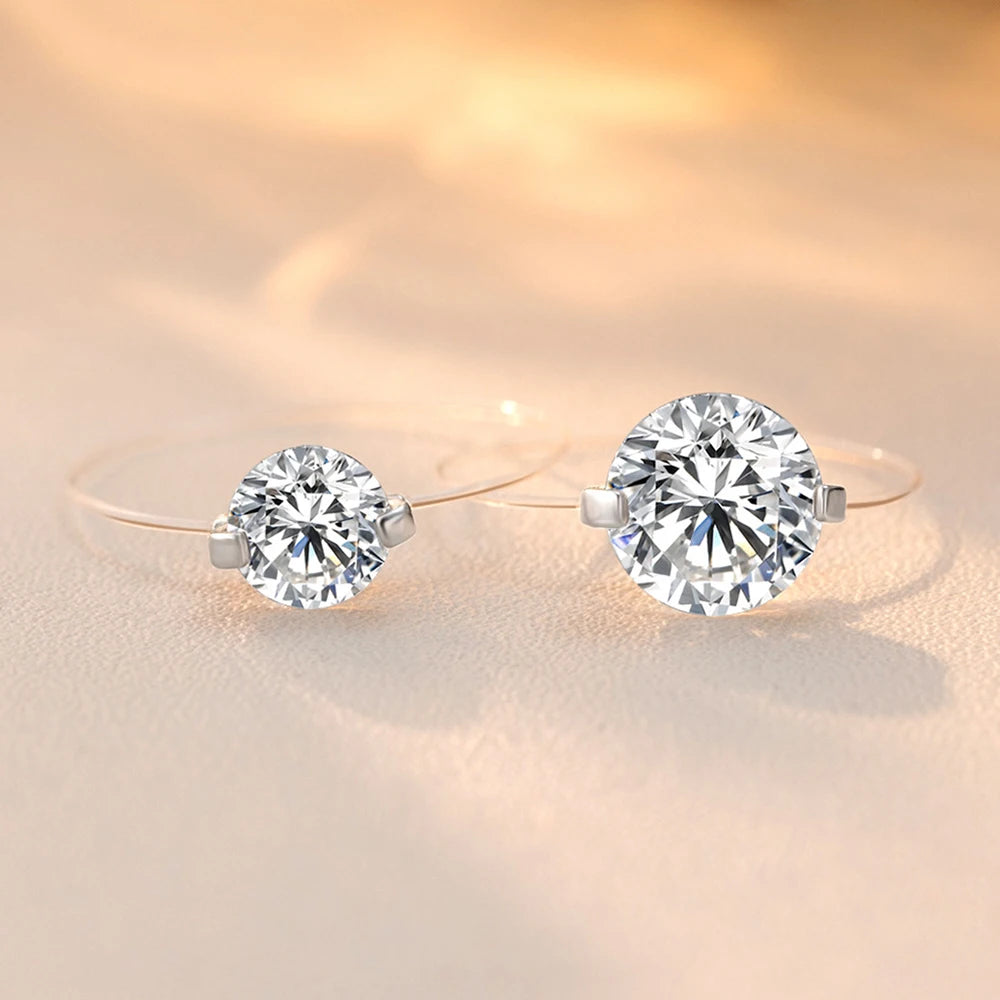 Evelyn Soliter Round Moissanite Transparent Fishing Line Ring