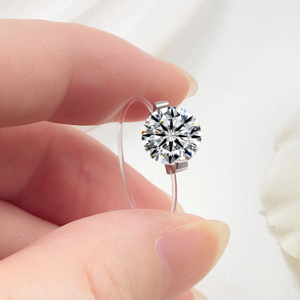 Evelyn Soliter Round Moissanite Transparent Fishing Line Ring