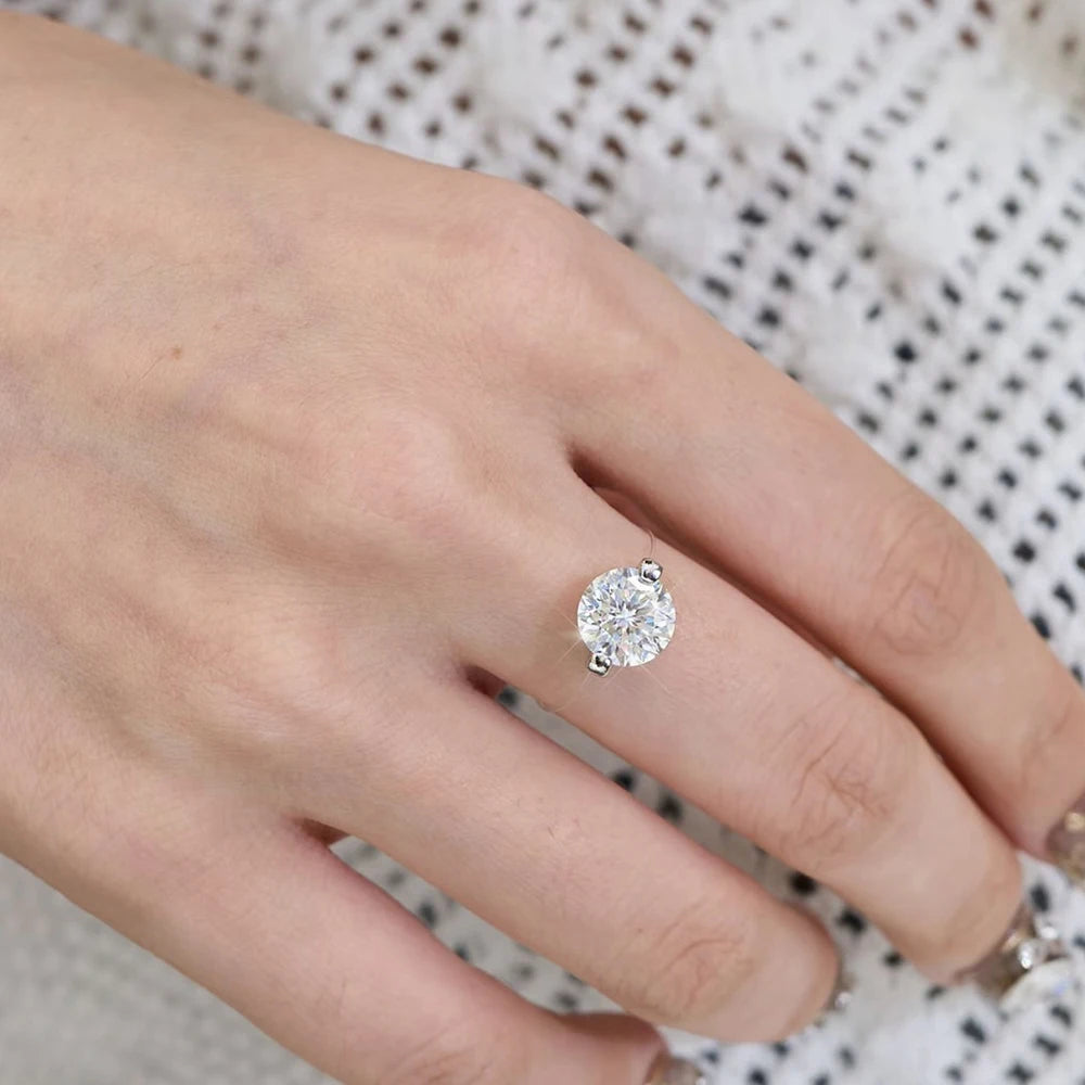 Evelyn Soliter Round Moissanite Transparent Fishing Line Ring